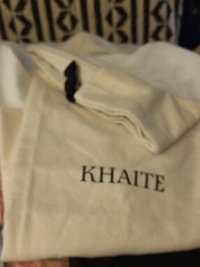 KHAITE Cream Canvas Logo Dust Pouch with Black Lettering